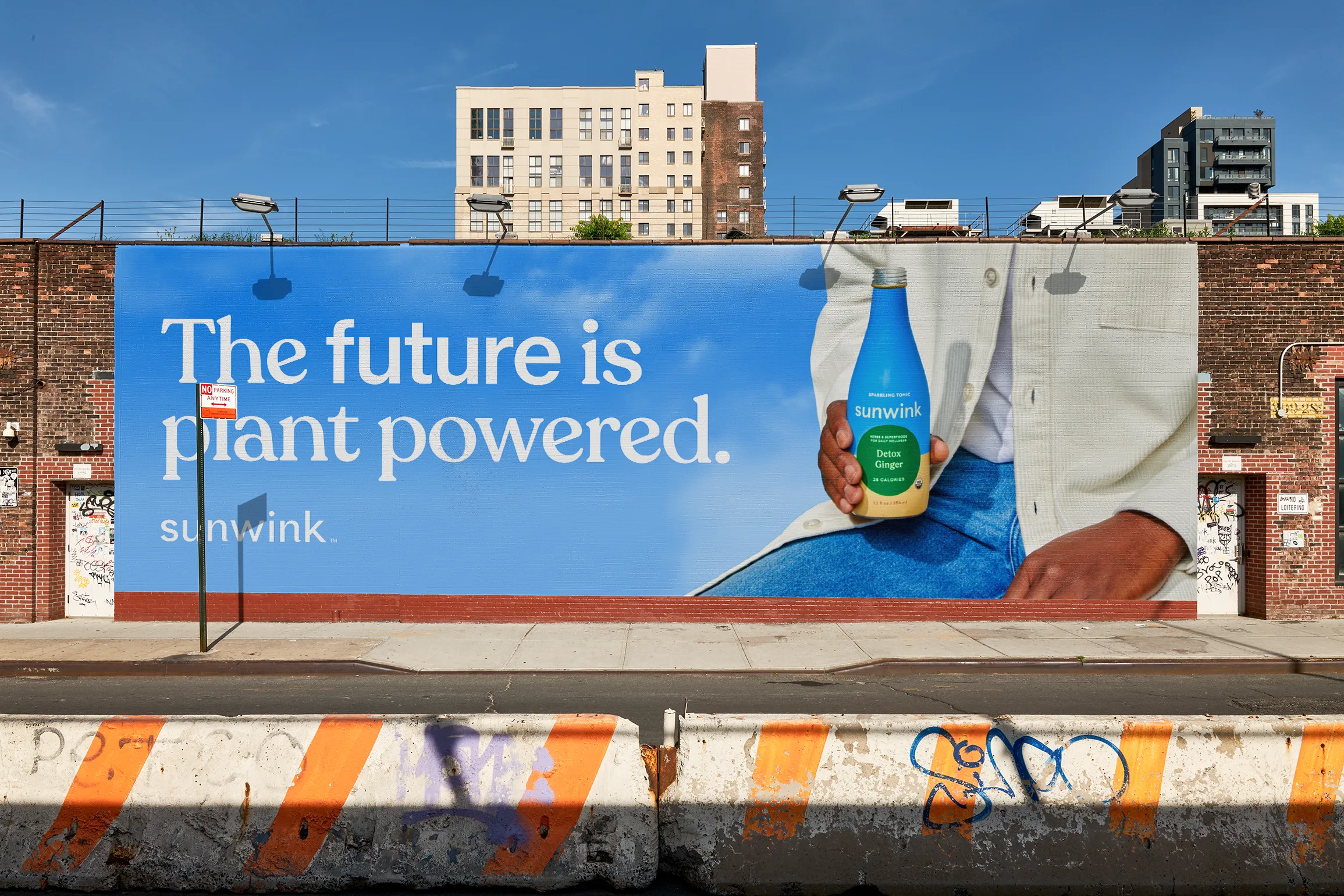 Sunwink billboard on a brick wall: The future is plant powered